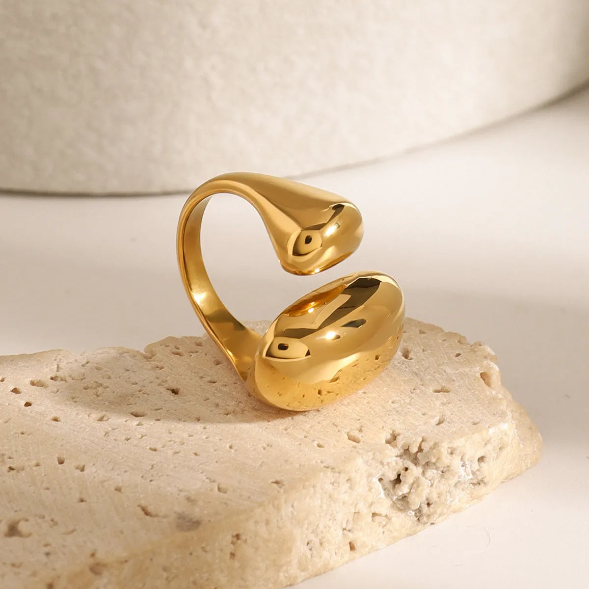 Stainless steel geometric open ring with electroplated metallic finish