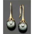 A pair of gold-coloured retro fashion earrings for women with an alloy construction.