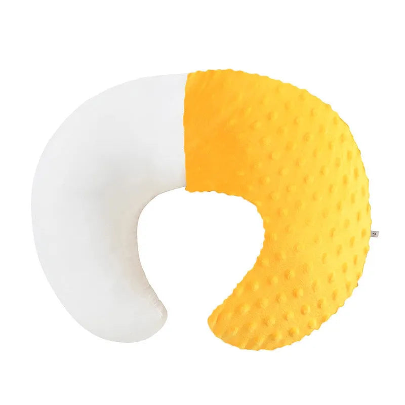 Grey nursing pillow for breastfeeding with removable cover on a neutral background