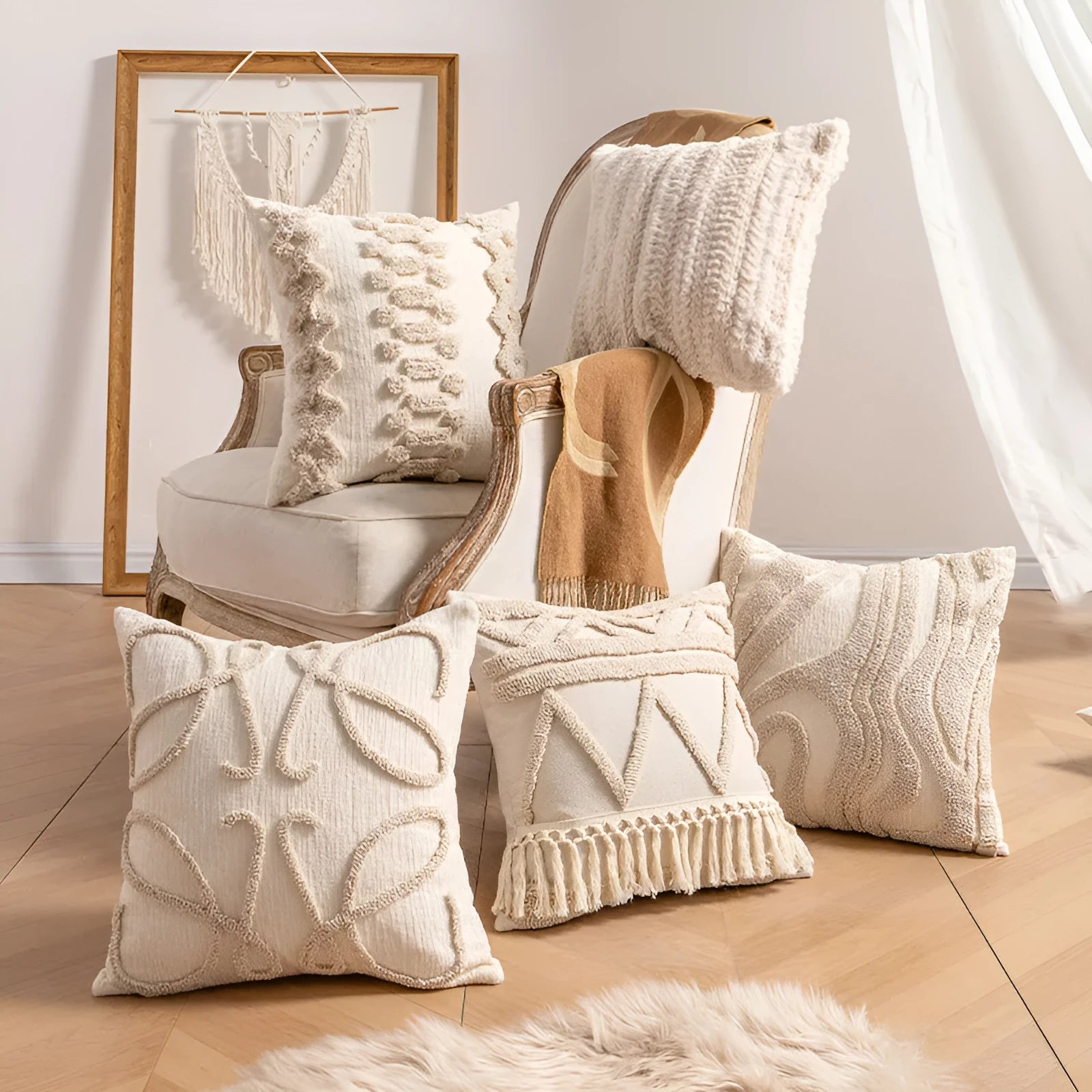 Knitted cushion cover with tassel trim in a choice of patterned designs including spiral dots and bow.