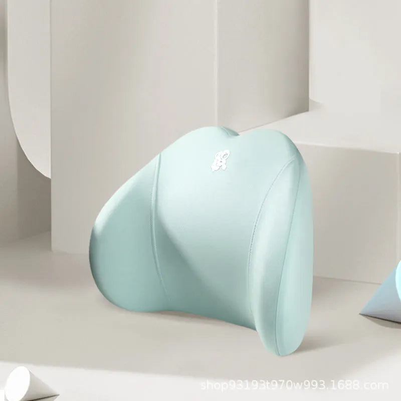 Heart-shaped car pillow in choice of colours, shown as headrest and lumbar support on a car seat.