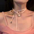 Women's silver-tone alloy necklace with ribbon love pendant on clavicle chain