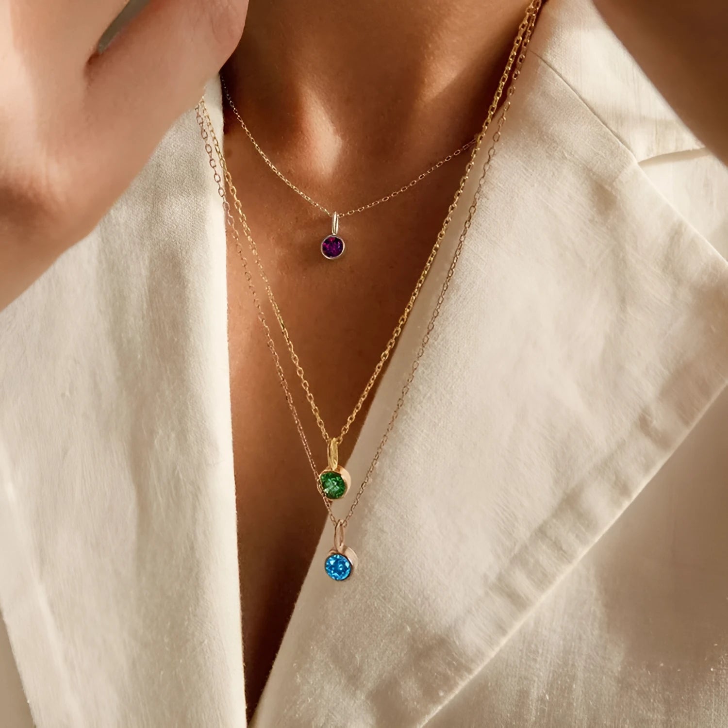 Entry Lux stainless steel U-shaped rhinestone pendant necklace in golden finish with month colour option