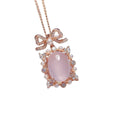 Natural pink rose quartz geometric pendant on a rose gold plated sterling silver necklace.