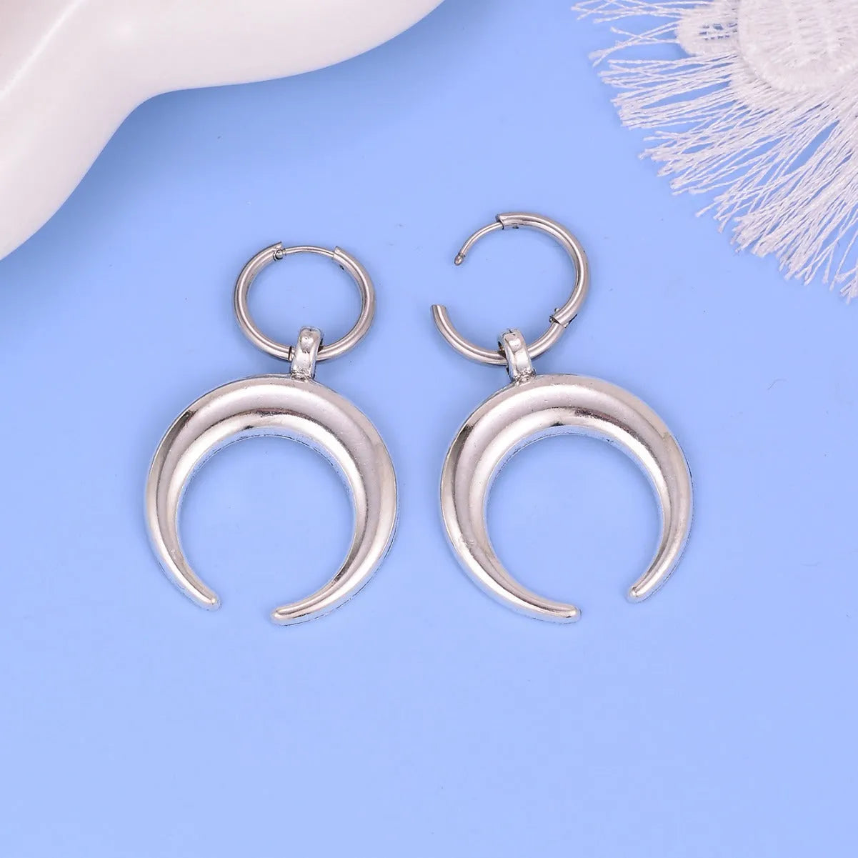 Silver gothic moon big hoop earrings with geometric shape and punk styling