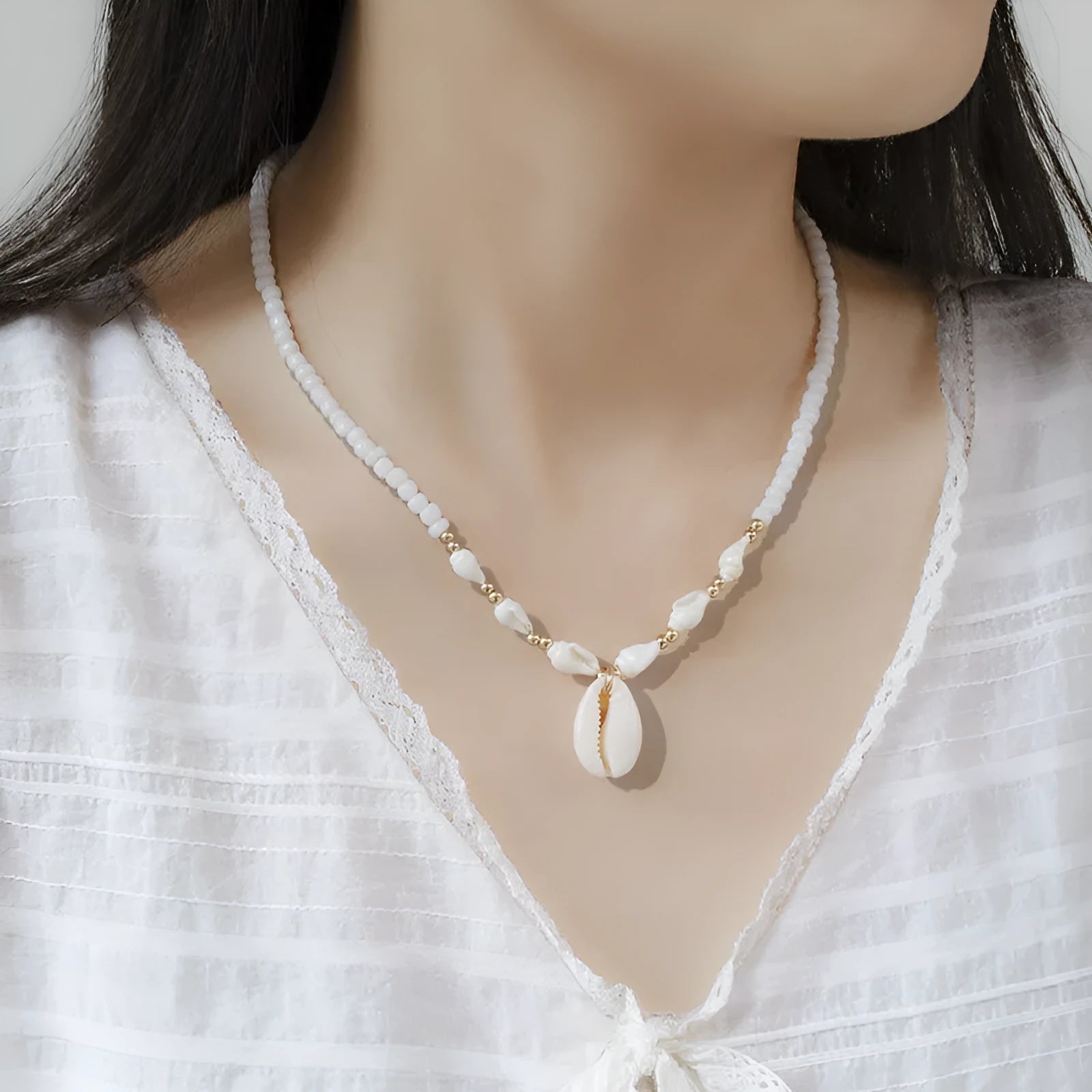 White conch bead necklace with mother pearl shellfish pendant on regular chain
