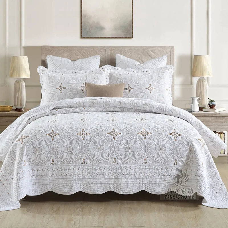 European style double thick pure cotton bed cover with embroidery, two pillowcases, on a 1.8 metre bed.