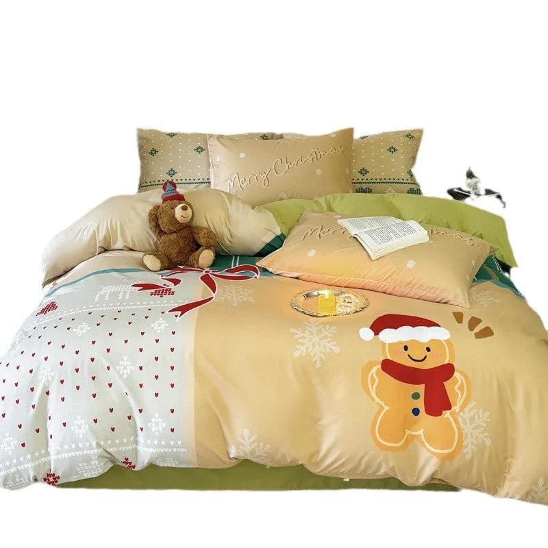 Christmas-themed cartoon printed duvet cover and pillowcase set on a bed, showing Gingerbread Man pattern.