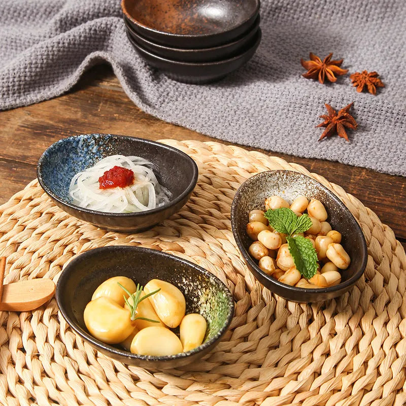 Japanese ceramic oval sauce dipping bowl with underglaze surface in traditional pattern