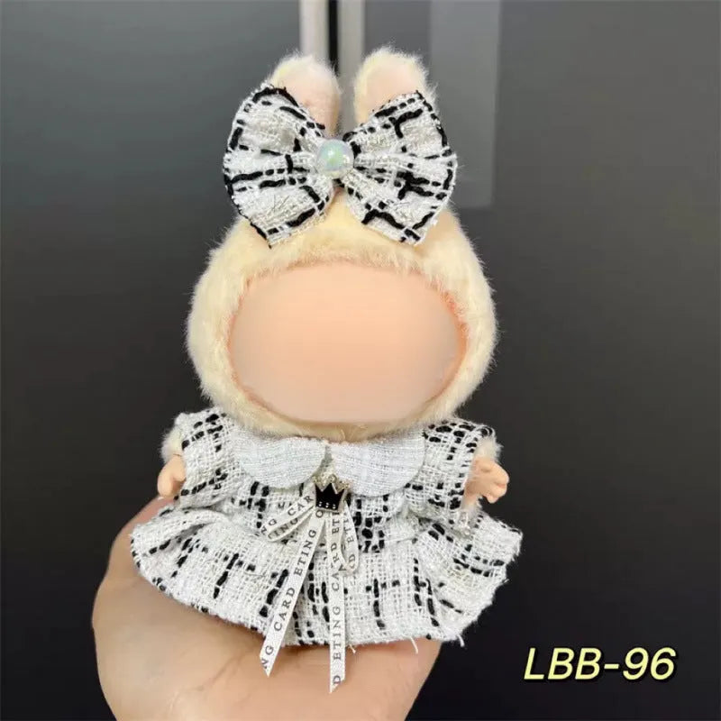 A plastic doll costume for a 17cm tall vinyl figurine on a white background.