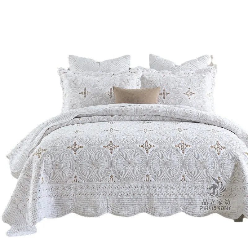 European style double thick pure cotton bed cover with embroidery, two pillowcases, on a 1.8 metre bed.