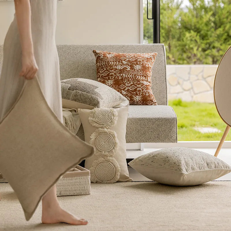 Square 45x45cm sofa cushion pillow in a solid colour and an abstract red-brown patterned option.