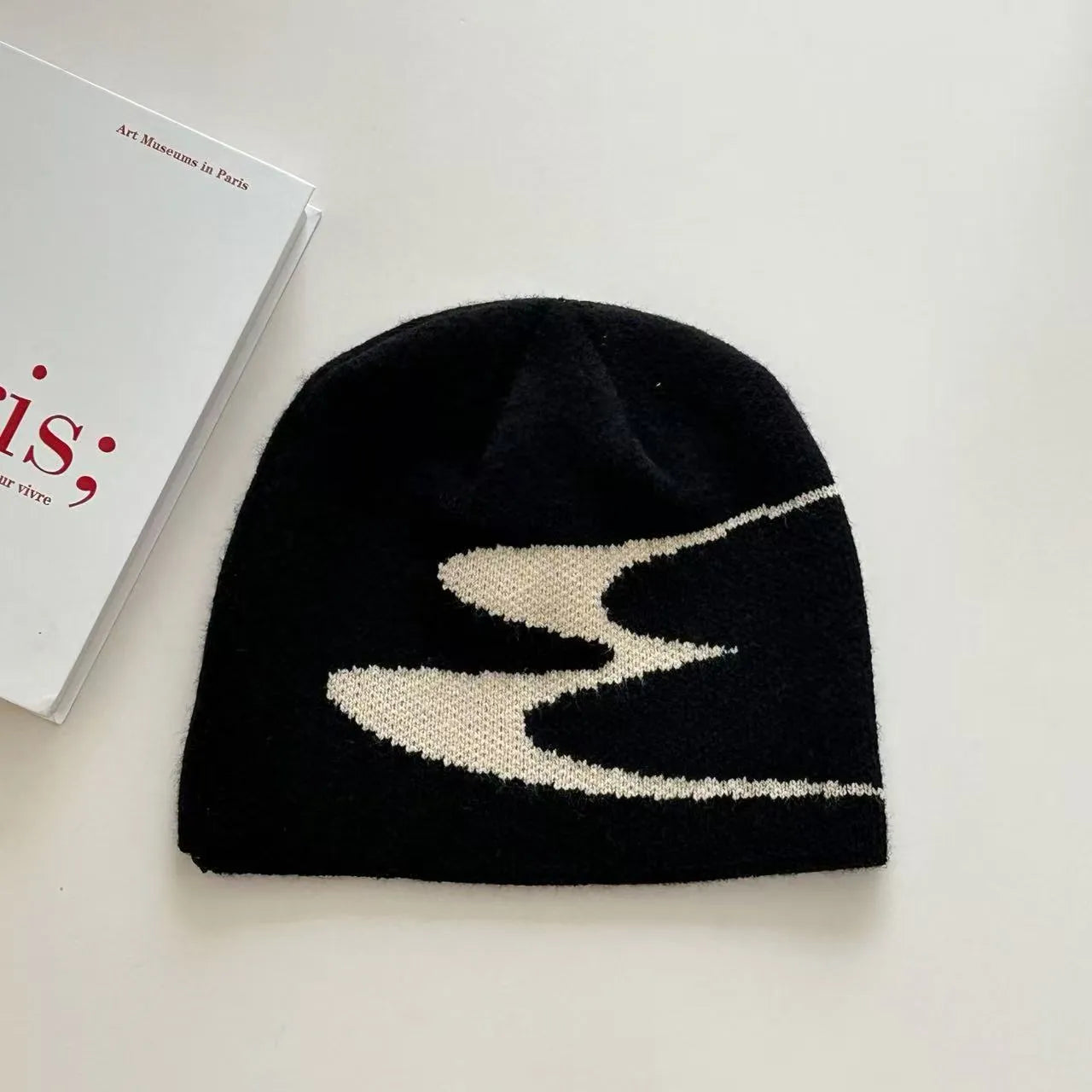Knitted acrylic beanie hat in black, grey or white colours for autumn and winter wear