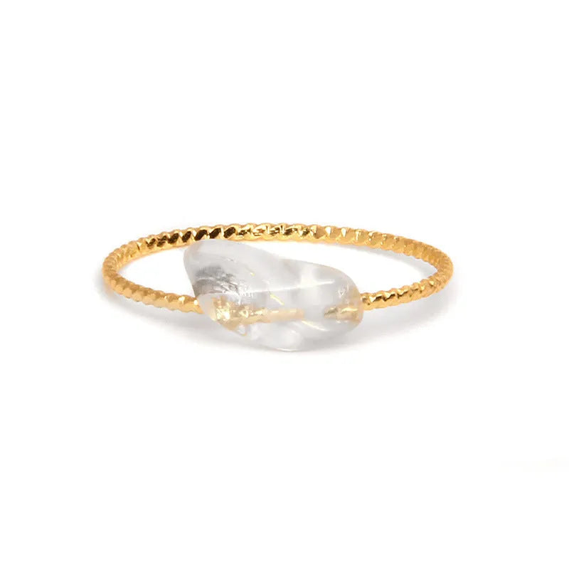 A women's ring featuring a geometric design set with a coloured agate stone.