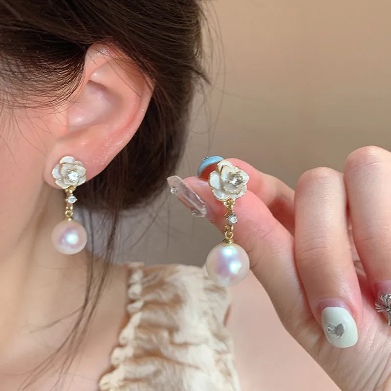 Camellia pearl flower stud earrings for women with alloy flower shape and silver-tone pearl detailing