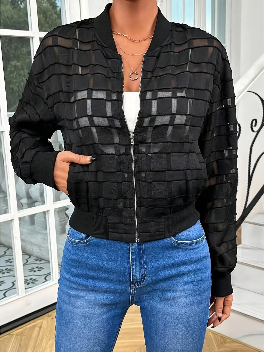 Black women's semi-transparent jacket with geometric pattern and front zipper
