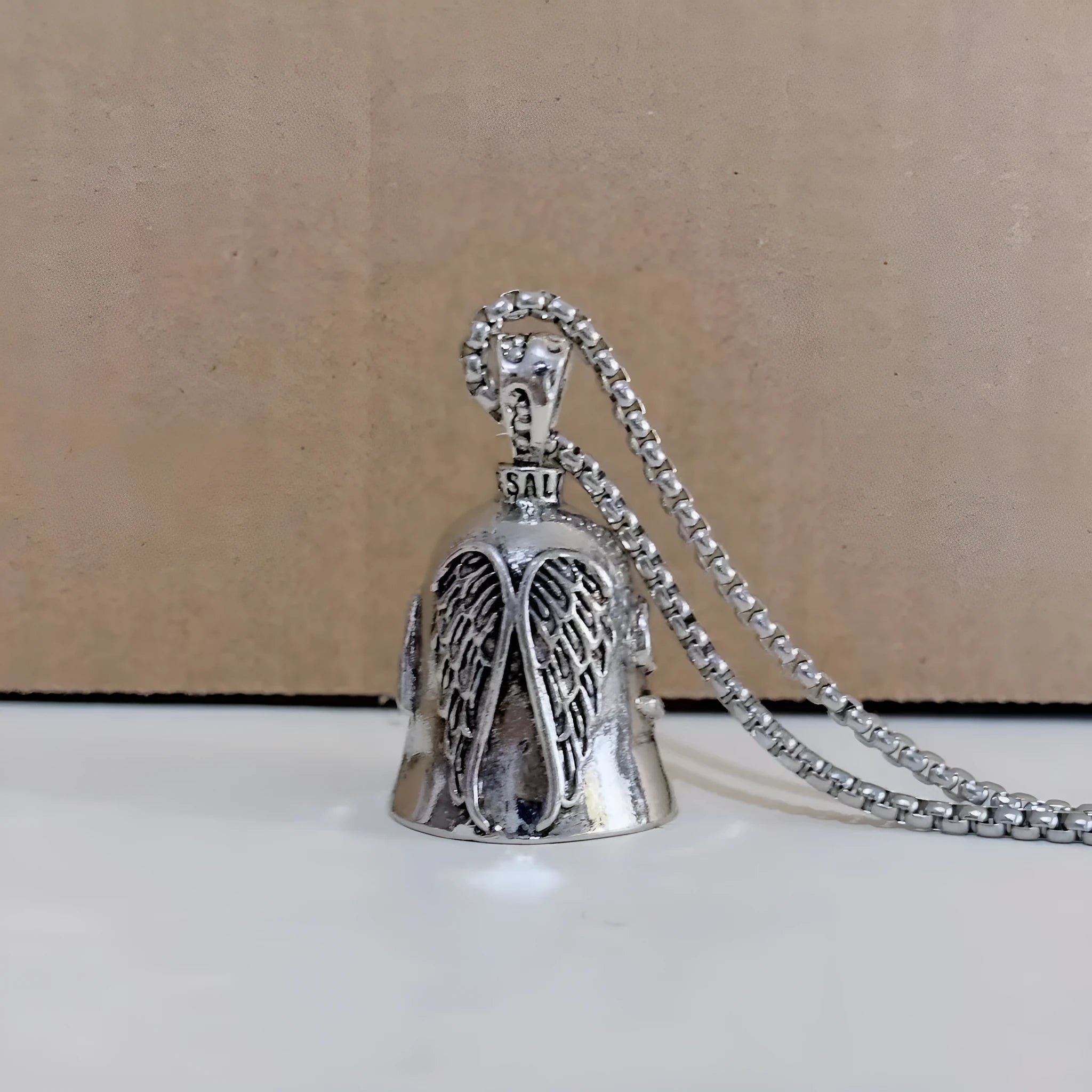 Vintage angel feather design necklace and matching keychain set in white alloy metal.