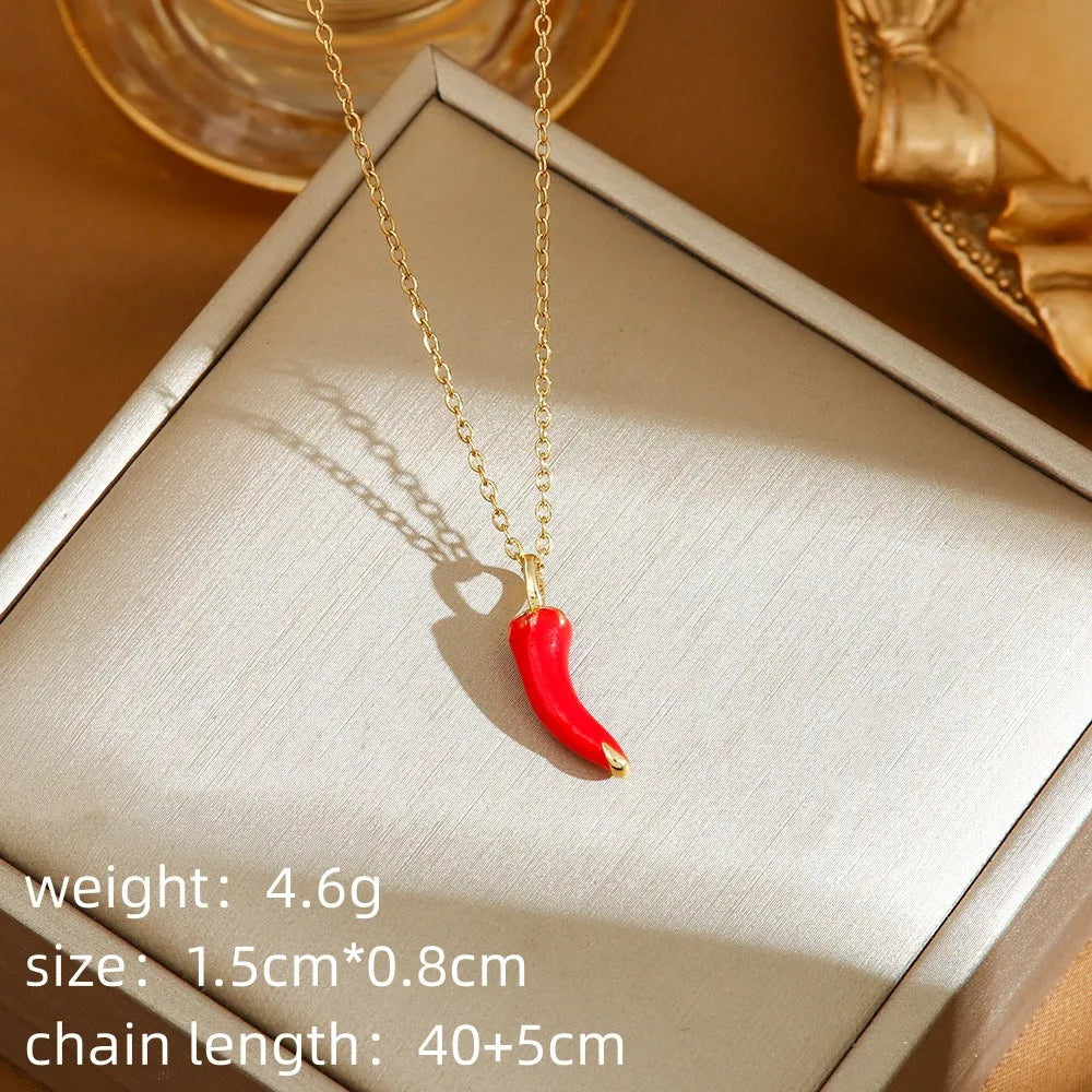 Titanium steel indie necklace with O-ring chain and a choice of cherry, strawberry, or pepper pendant in golden or steel finishes.