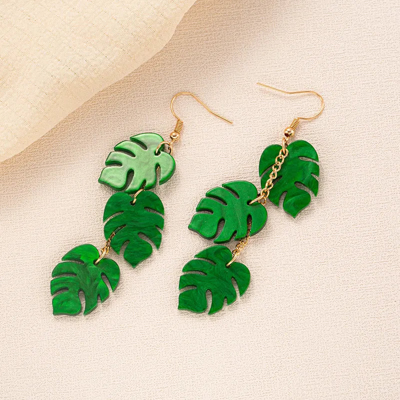 Acrylic drop-shaped coconut artocarpus earrings with alloy hook in one of five colourful styles.