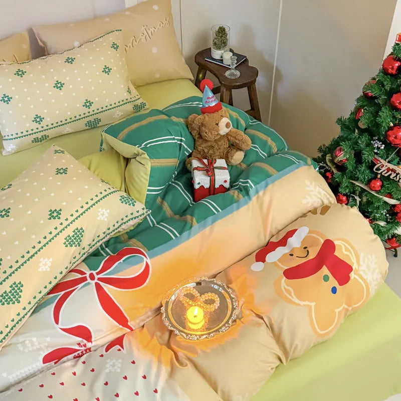 Christmas-themed cartoon printed duvet cover and pillowcase set on a bed, showing Gingerbread Man pattern.