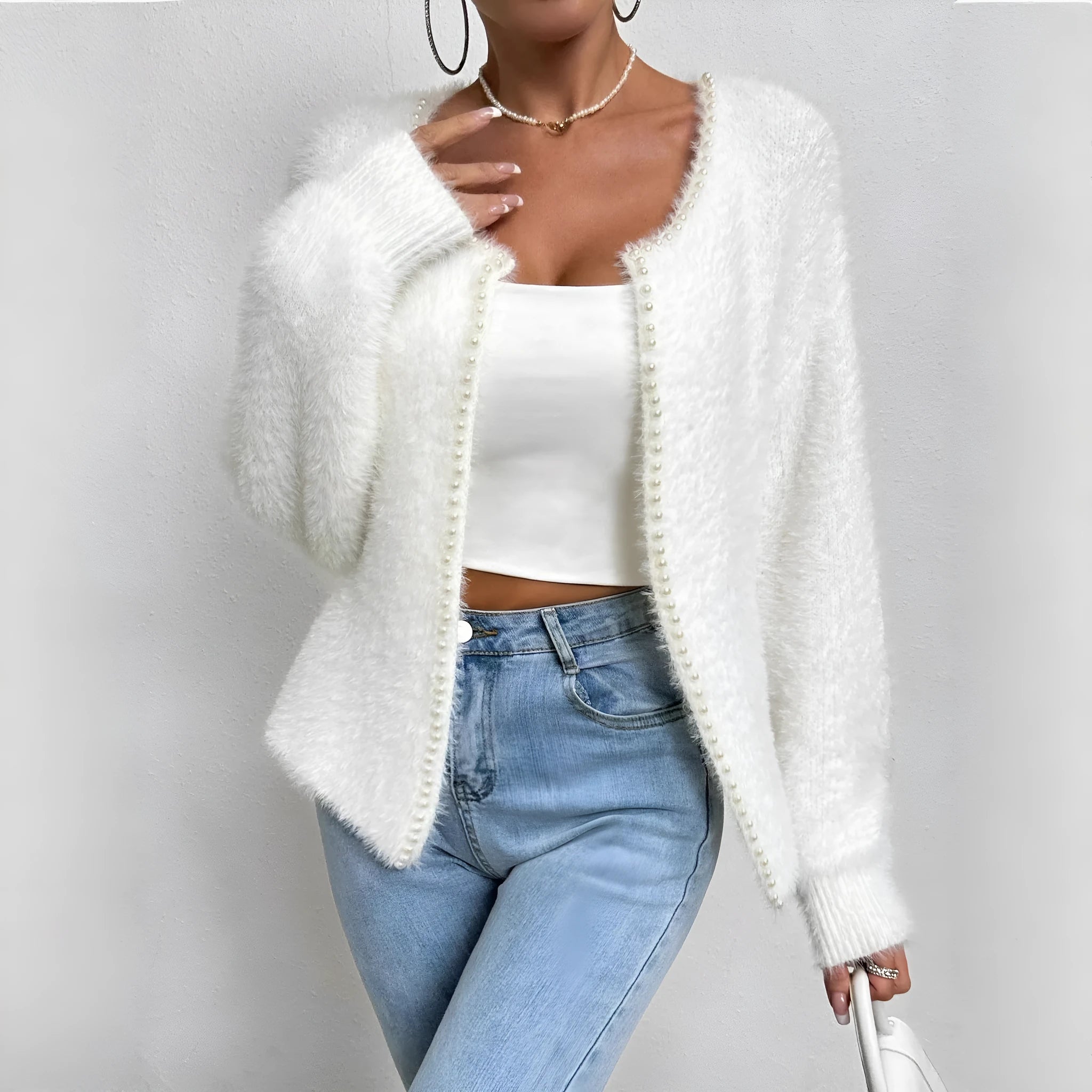 White women's V-neck cardigan sweater with medium thickness and normal length