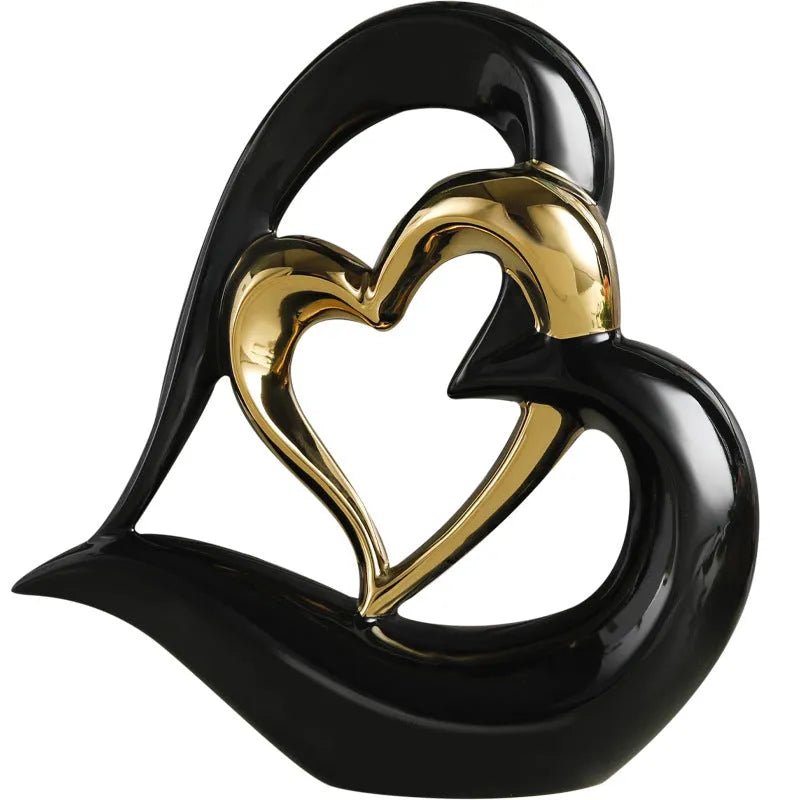 Modern white porcelain heart ornament on display in a choice of eight metallic and coloured finishes.