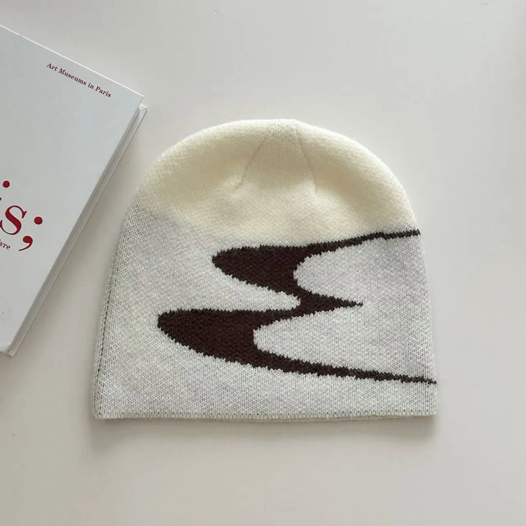 Knitted acrylic beanie hat in black, grey or white colours for autumn and winter wear
