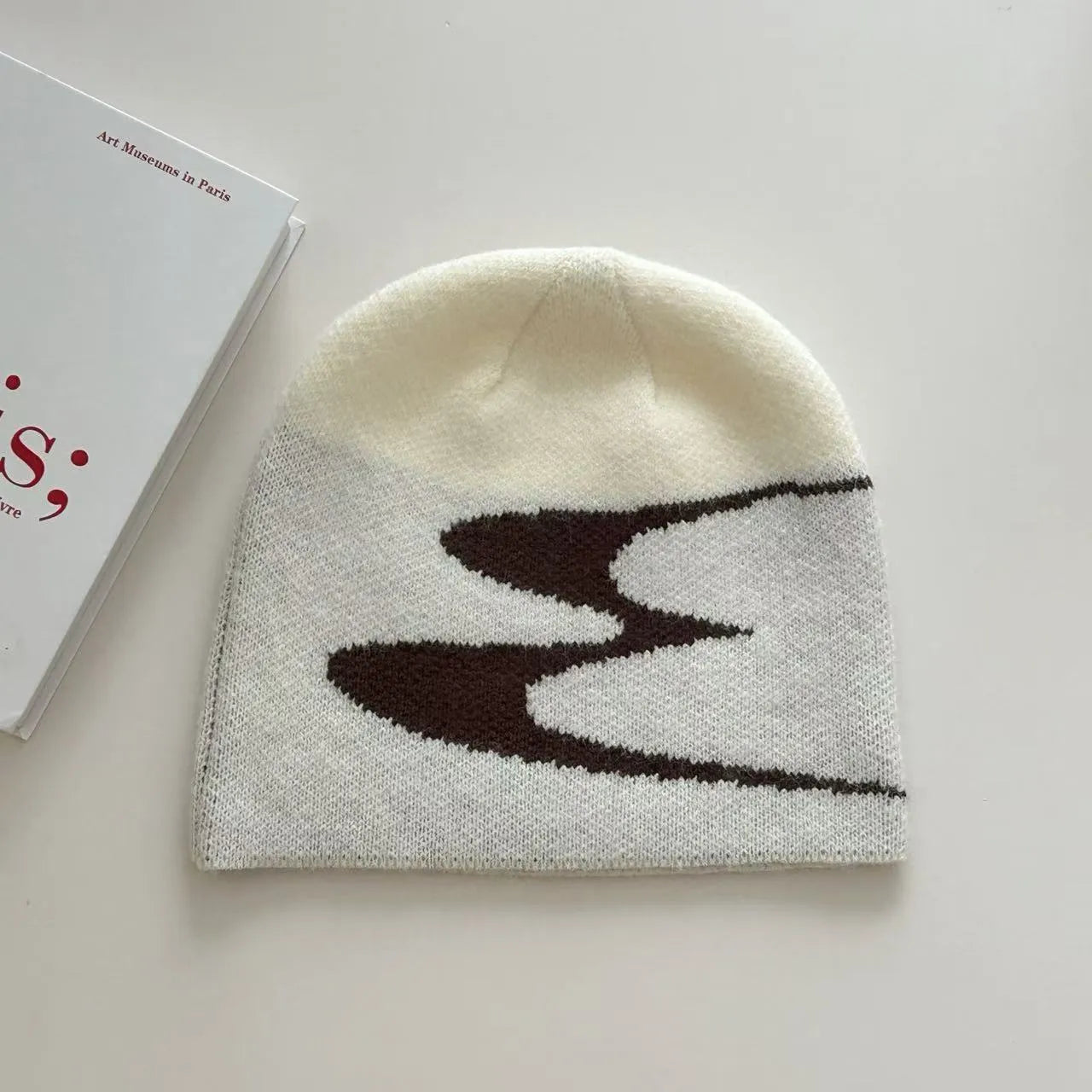 Knitted acrylic beanie hat in black, grey or white colours for autumn and winter wear