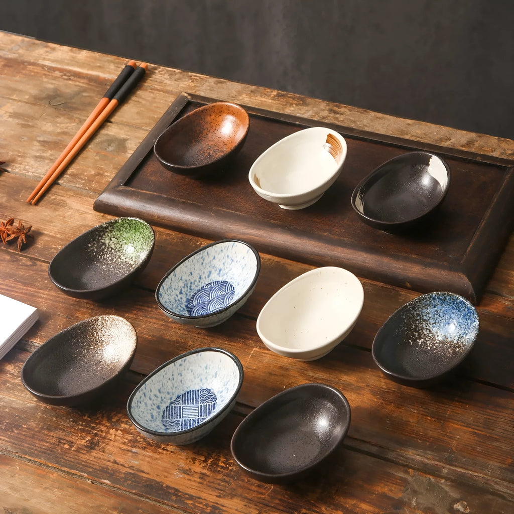 Japanese ceramic oval sauce dipping bowl with underglaze surface in traditional pattern