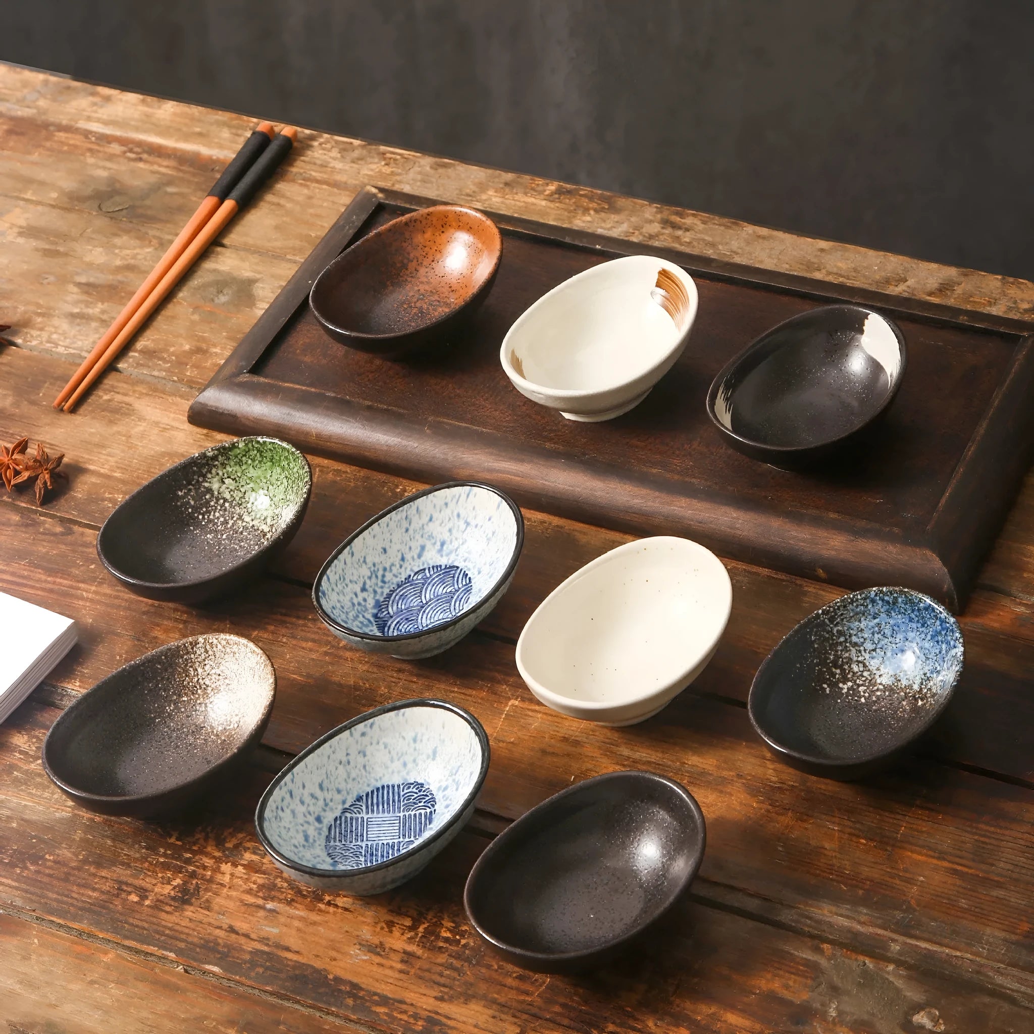 Japanese ceramic oval sauce dipping bowl with underglaze surface in traditional pattern