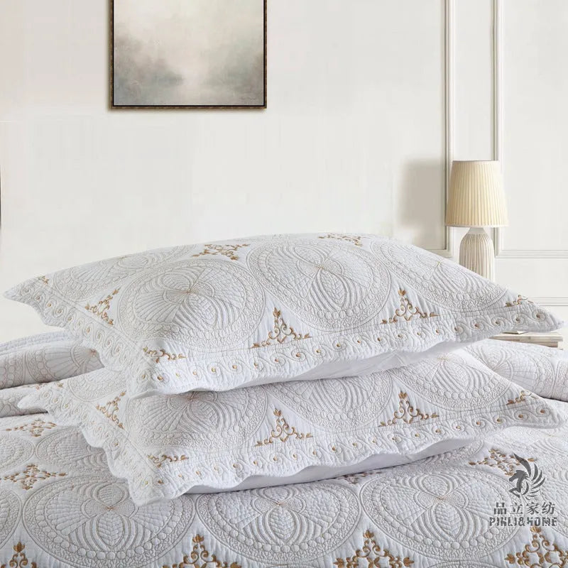 European style double thick pure cotton bed cover with embroidery, two pillowcases, on a 1.8 metre bed.