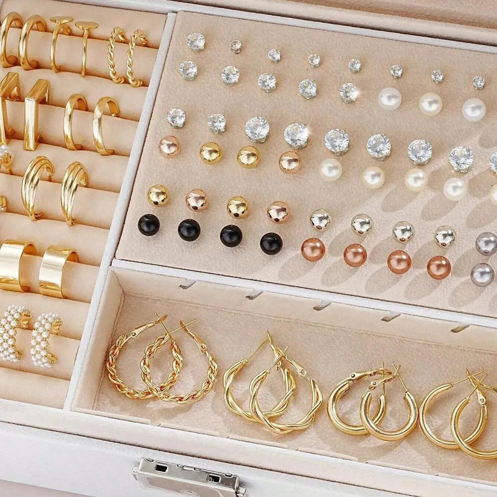 108 geometric pearl earrings in gold and yellow electroplated alloy arranged in combination set