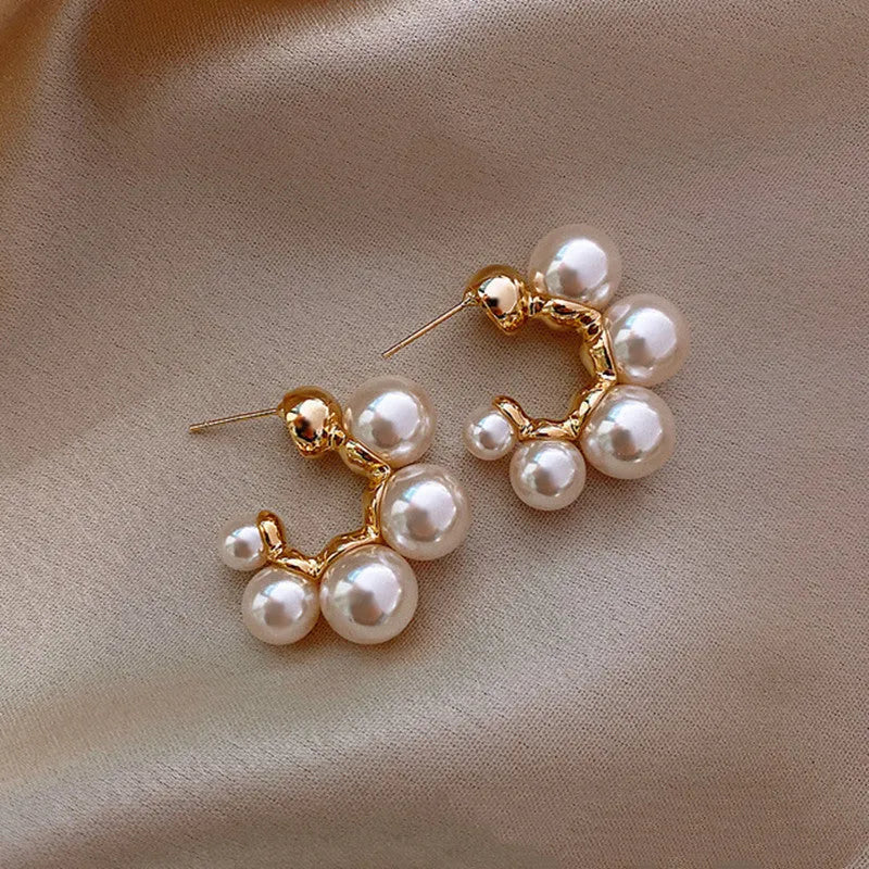 Red bell-shaped alloy earrings for women shown alongside white colour option