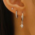 Geometric ladies earring set with zircon detailing in gold and white colours