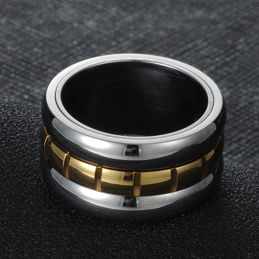 Ultra-wide gold titanium steel knuckle ring with rotating band on hand