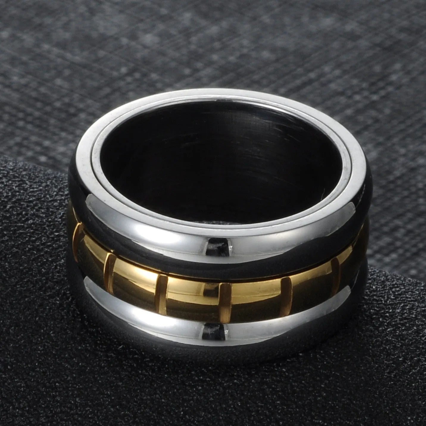Ultra-wide gold titanium steel knuckle ring with rotating band on hand