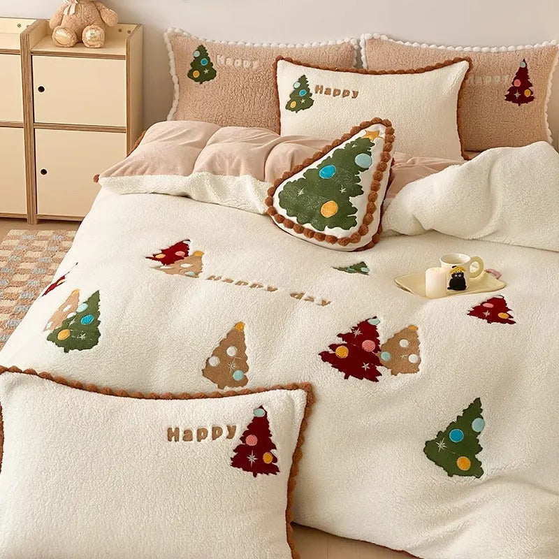 Bright yellow fleece-lined bedding set with embroidered Christmas tree pattern, shown on a double bed.