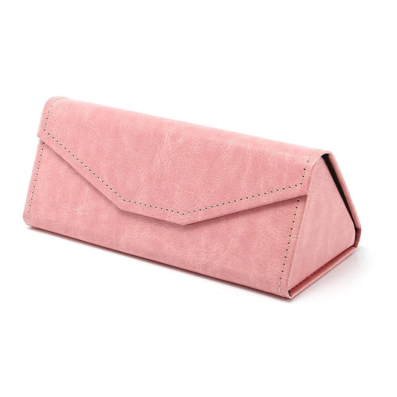 Handmade black PU cowhide triangle folding glasses case showing compact 160x66x16mm size