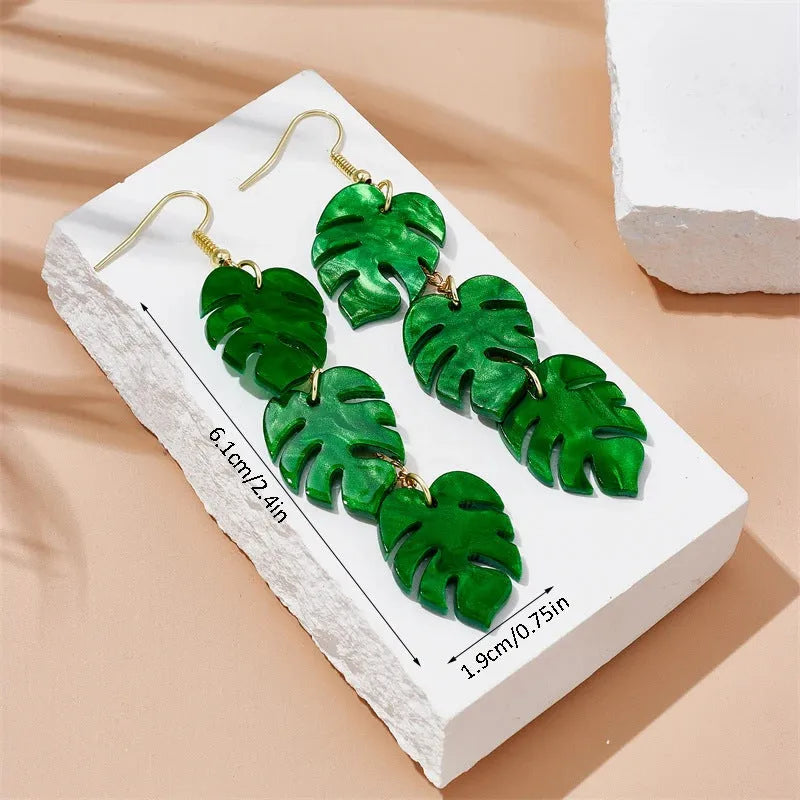 Acrylic drop-shaped coconut artocarpus earrings with alloy hook in one of five colourful styles.