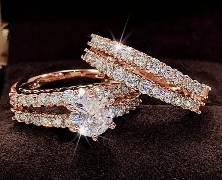 2-in-1 fully-jewelled female ring set in geometric design with round elements, shown in silver, gold and rose gold finishes