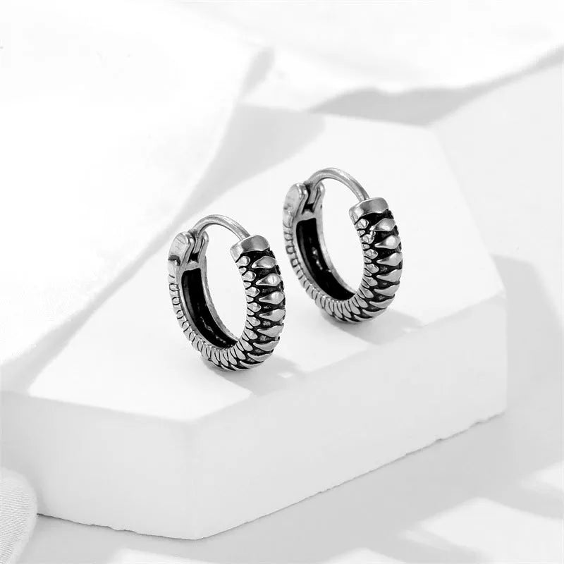 Silver geometric retro twist earrings with striped pattern made from stainless steel alloy