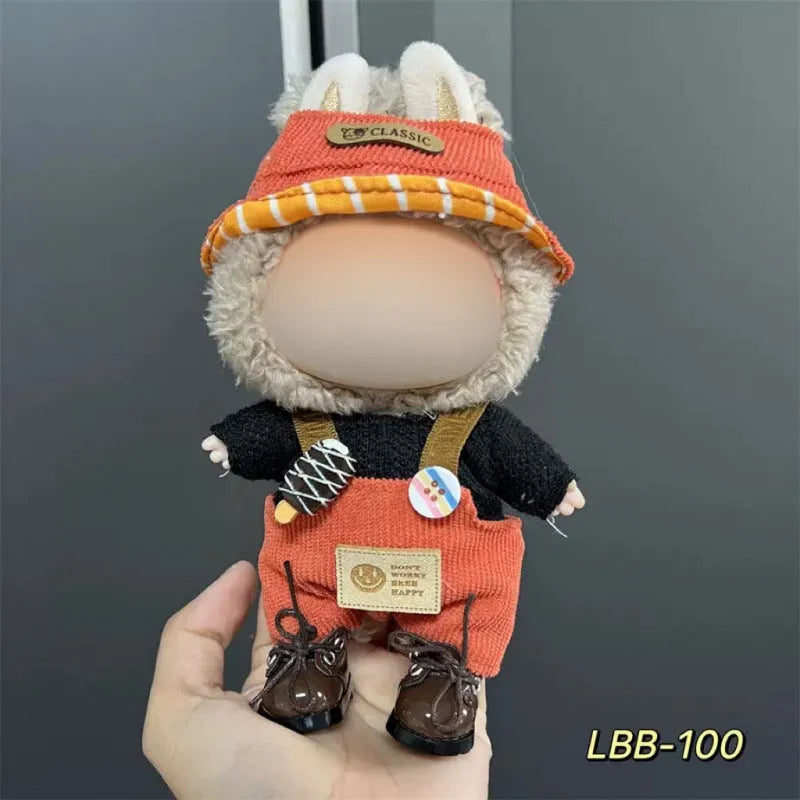Plastic clothing outfit for a 17cm tall vinyl figure or doll on a display stand.