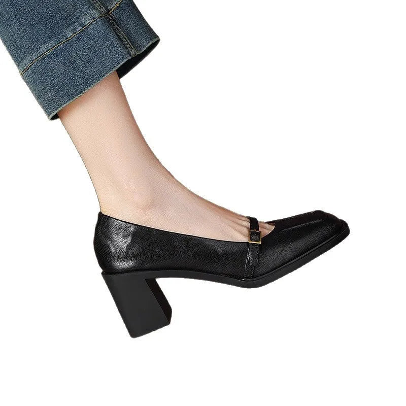 Women's black retro square toe soft high heel pumps with buckle closure on a neutral background
