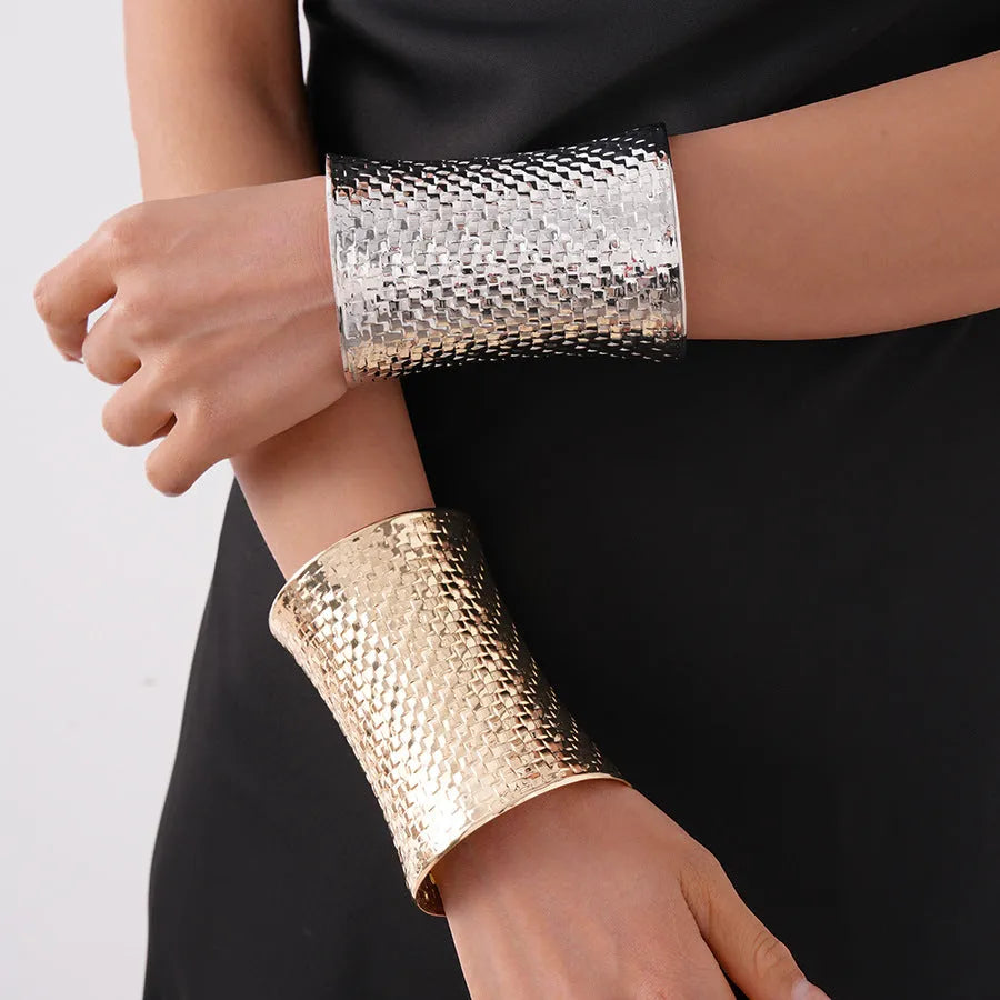 Women's vintage exaggerated gold silver metal bracelet with round design measuring 6.5cm by 9.7cm