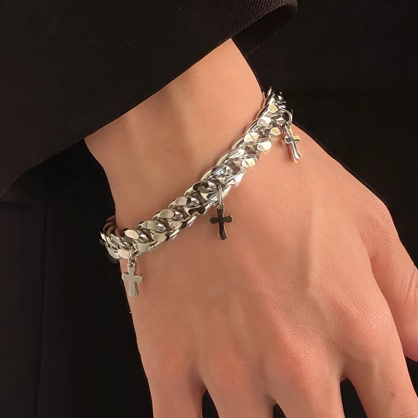 Men's titanium steel bracelet with a geometric shape and a central cross pendant.