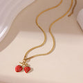 Stainless steel strawberry pendant necklace with powder gradient finish on alloy chain