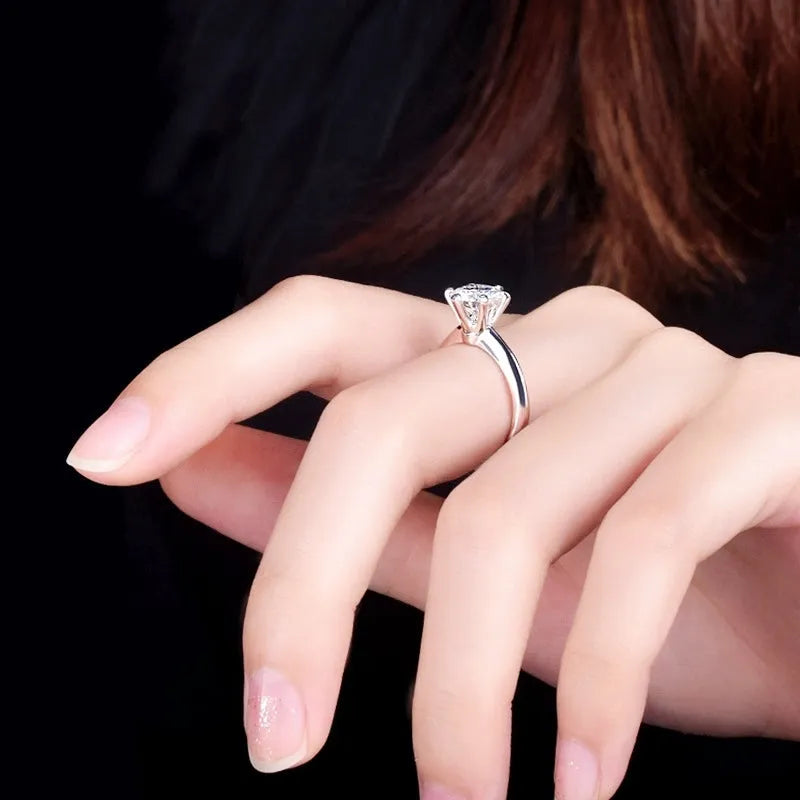Women's six-claw inlaid zircon ring in white gold plated finish on geometric band