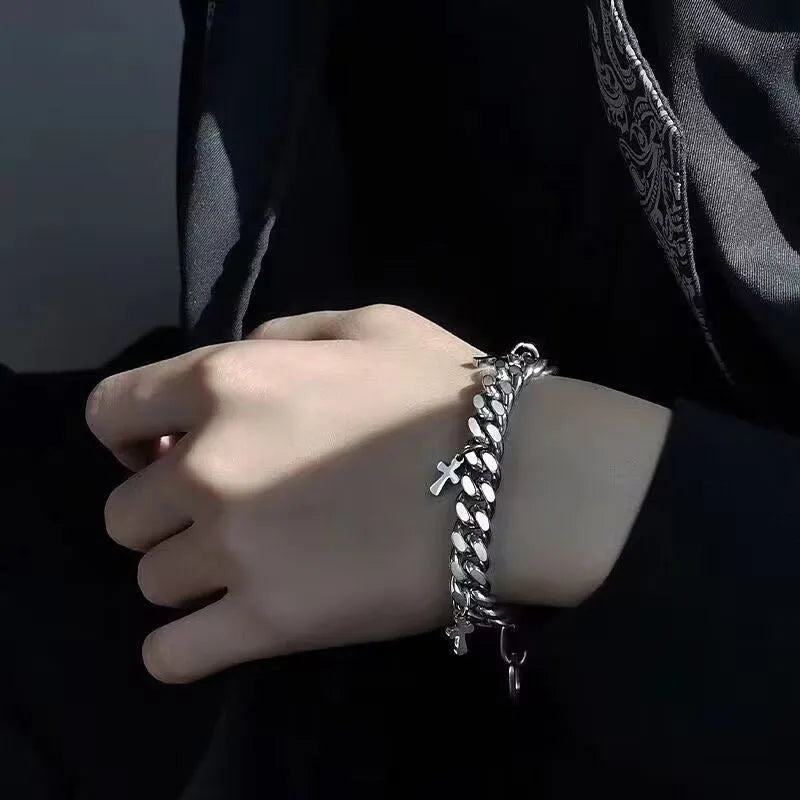 Men's titanium steel bracelet with a geometric shape and a central cross pendant.