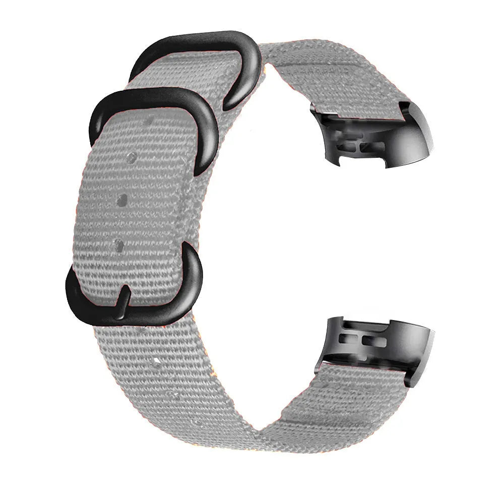 Army Green nylon replacement strap with three-ring buckle for Fitbit Charge 2, 3, 4, and 5 fitness trackers.