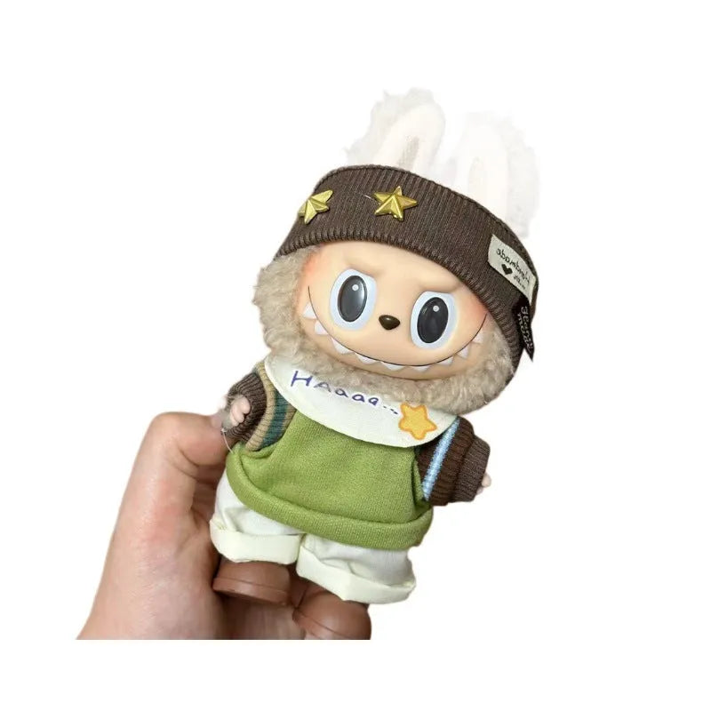 A plastic doll costume for a 17cm tall vinyl figurine on a white background.